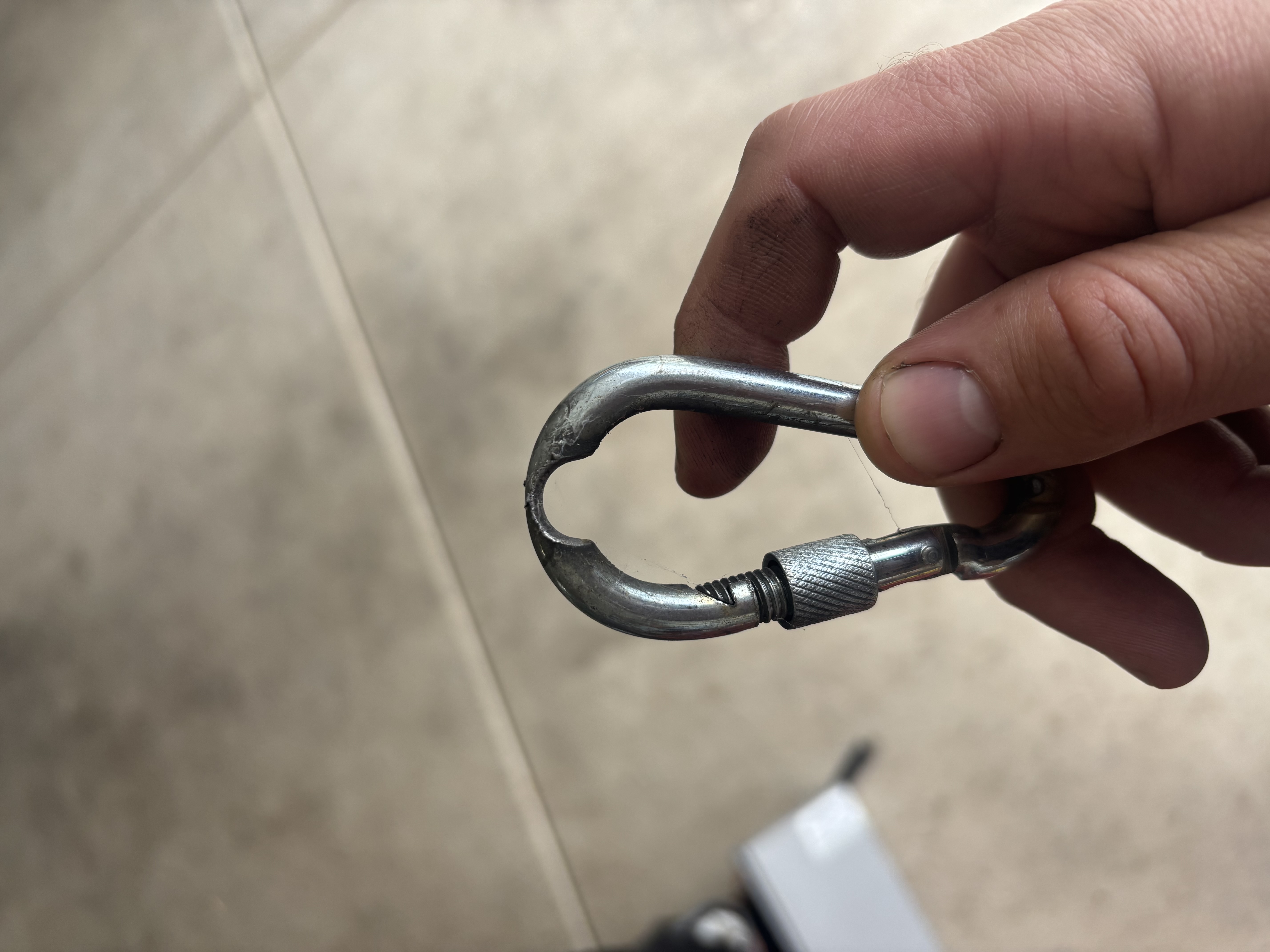 Carabiner worn down